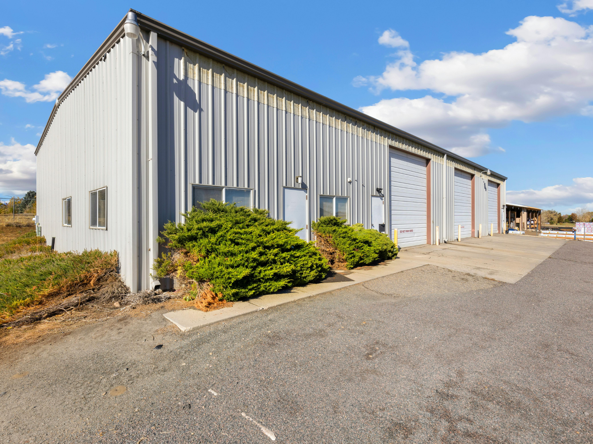 Business owner monitoring commercial property from phone or computer